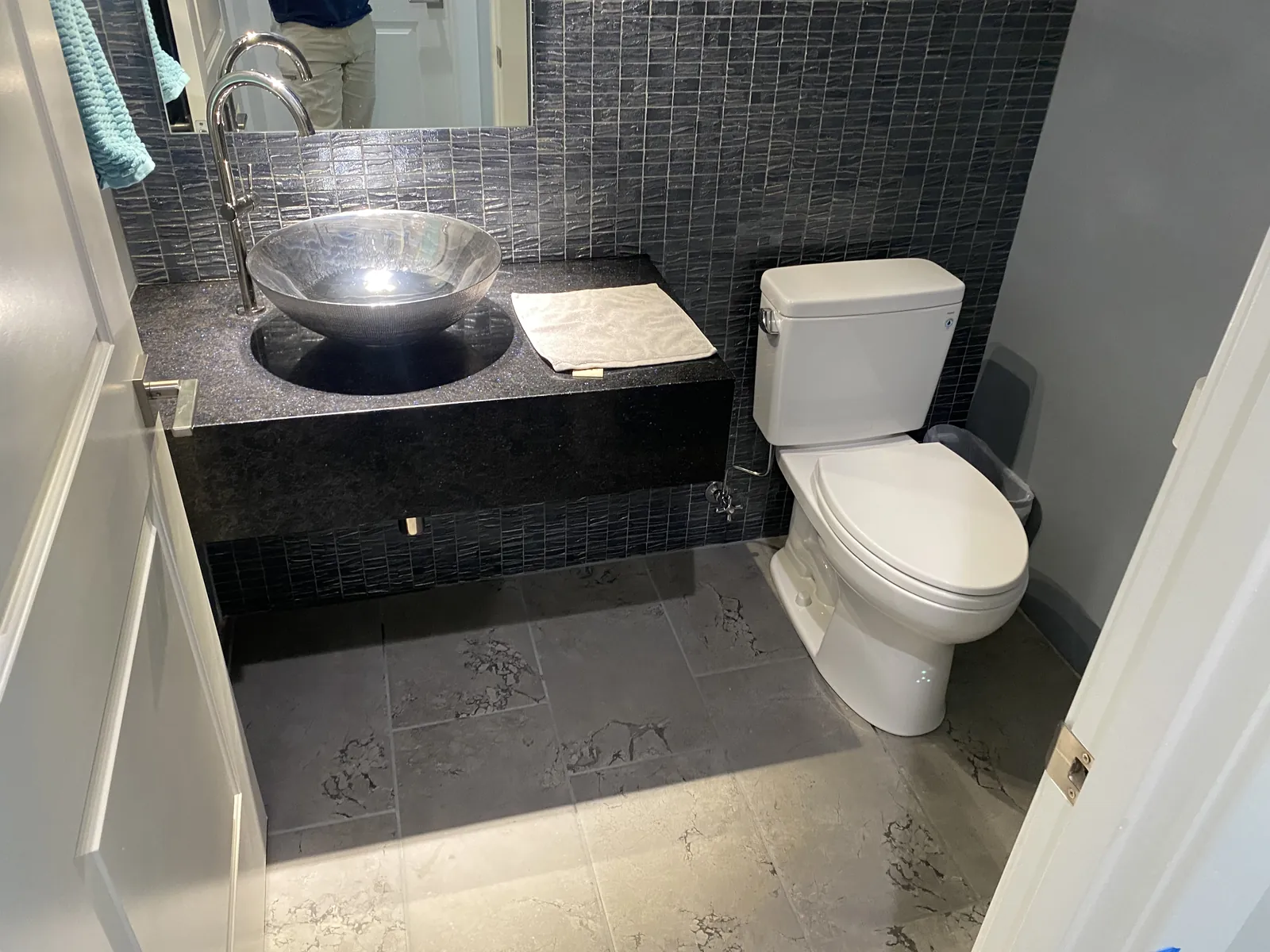 Powder bathroom with new Toto toilet, vessel sink and tall chrome faucet installed by Max Plumbing in Surprise, AZ
