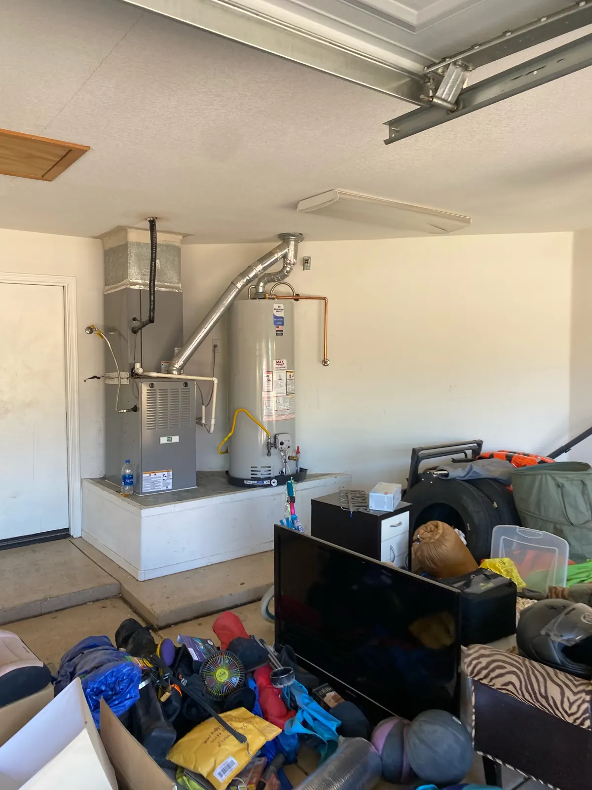 Gas water heater installation in a garage by Max Plumbing in Surprise, AZ