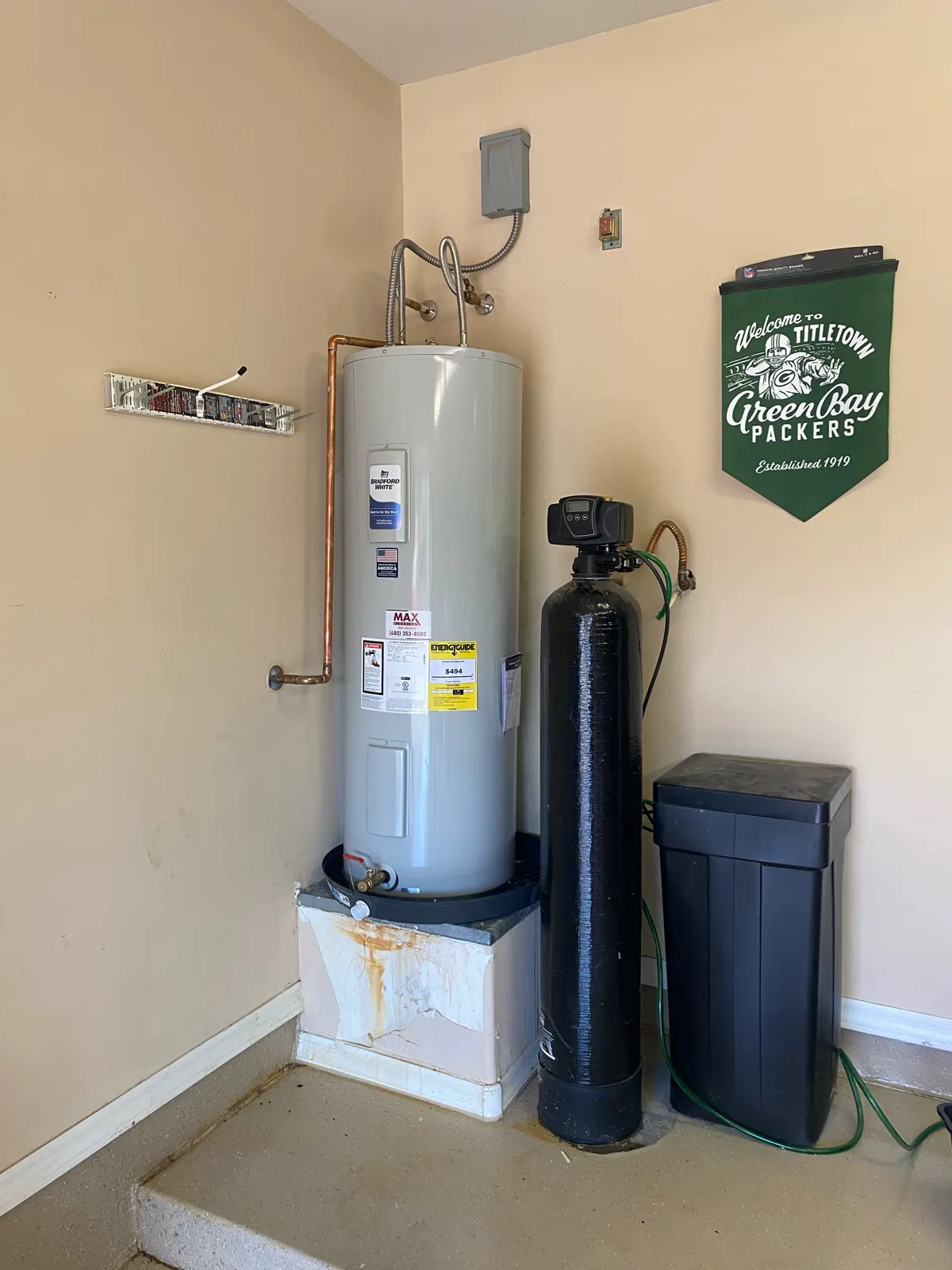 Electric water heater and whole-home water softener installed by Max Plumbing in Surprise, AZ